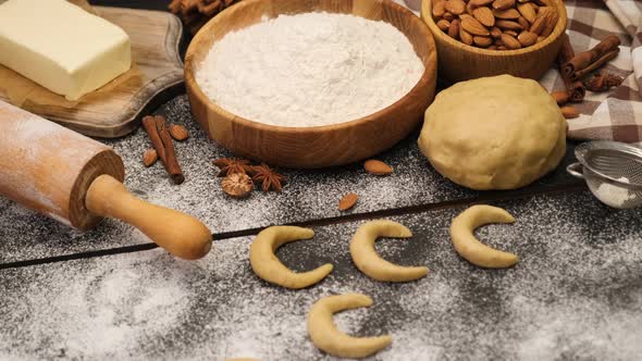 Woman Hands Closeup  Making Traditional German or Austrian Vanillekipferl Vanilla Kipferl Cookies