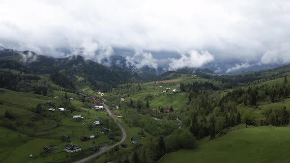 Village in the Mountains. Slow Motion. Carpathians. Ukraine. Aerial