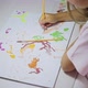 Child Paints at the Table - VideoHive Item for Sale