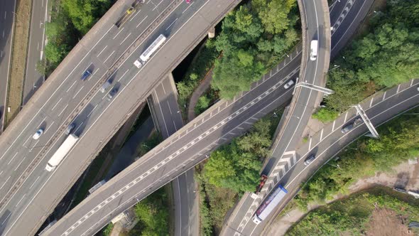 Vehicles Driving on a Spaghetti Interchange Bird's Eye Aerial View