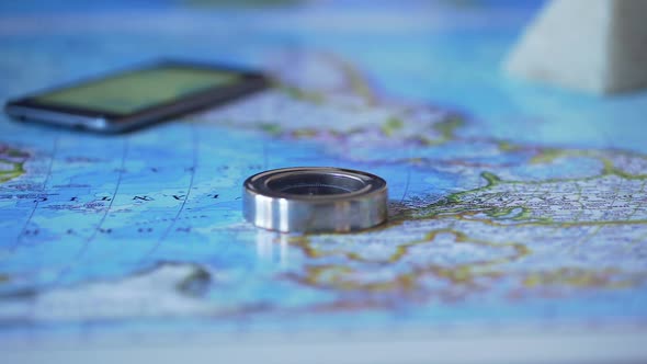 Man Studying Africa Continent on Map, Choosing Travel Destination for Vacation