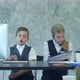 Little Boy and Cute Girl in Business Suits Working in the Office Together - VideoHive Item for Sale