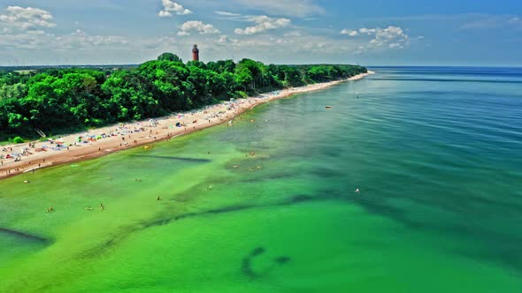 Tourism in Poland by sea. Crowded beach at Baltic Sea.