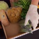 Woman in the Protective Medical Gloves Unpacking Donation Box.  Top View - VideoHive Item for Sale