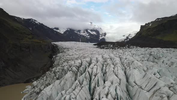 Iceland glacier close up above with drone video moving forward.