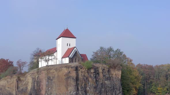 Church Overlooking a Small Lake on a Foggy Morning in Germany