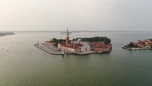 Drone approaching one of the Venice Islands - San Giorgio Maggiore, Italy