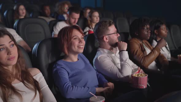 Young Couples Watching Comedy Cinema