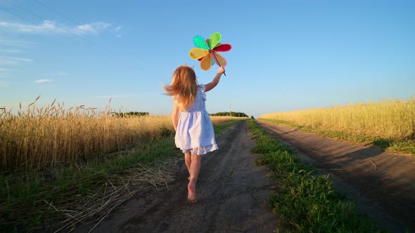 Portrait of a Little Girl in the Wheat Field.