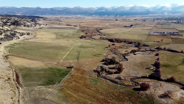 Aerial footage of the rural farmland countryside of Utah.