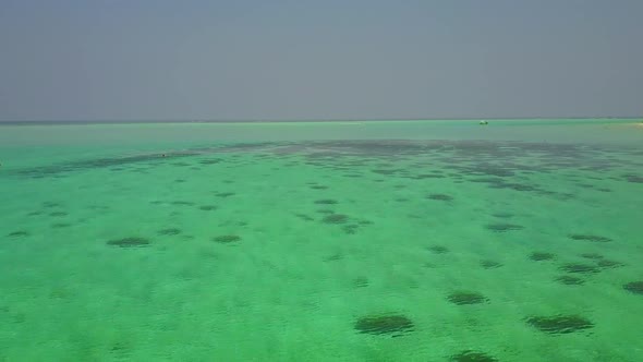 Empty seascape of seashore beach by water and sand background near sandbank