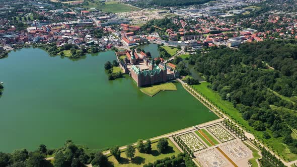 Scenic View Over Frederiksborg Castle And Surroundings In Hillerod, Denmark - aerial drone shot