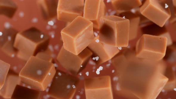 Super Slow Motion Detail Shot of Salted Caramel Explosion Towards Camera at 1000Fps