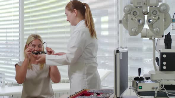 Optometrist Using Trial Frame during Eye Exam