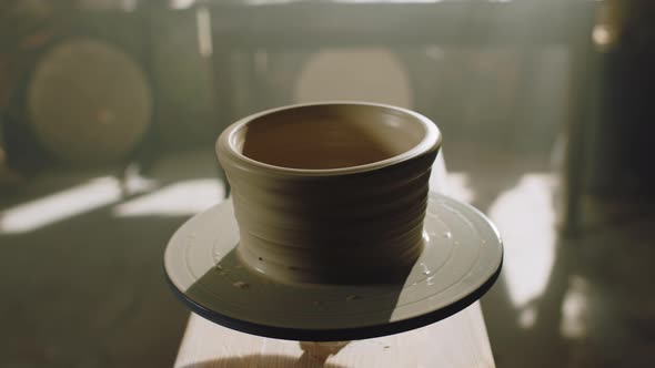 Raw Clay Pot Is Rotating On Wheel