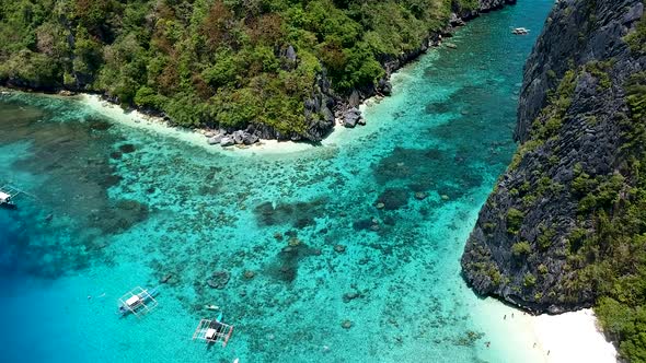 Aerial of white sand beach on Shimizu island beach El Nido, Palawan, Philippines