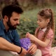 Daughter Kid With Father Eating Sweets. Daughter With Cheerful Father Eat Candy. Jelly Candies. - VideoHive Item for Sale