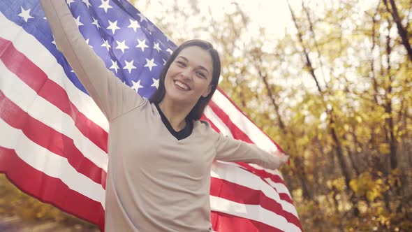 Cheerful Woman with USA Flag