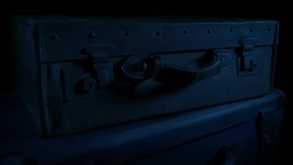 Suitcases In The Dark Moving Shot
