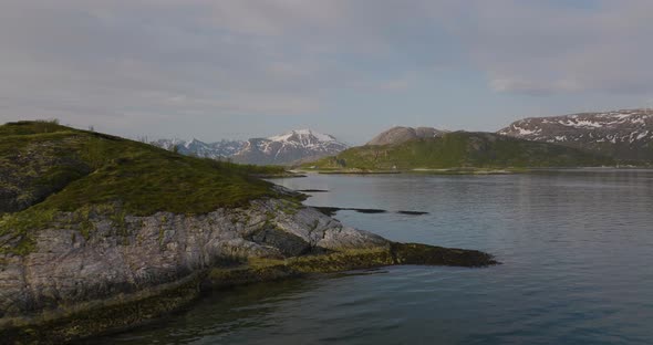 Beautiful Norwegian landscape, seagulls fly over islets. Northern Norway - Drone, Aerial.