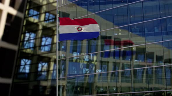 Paraguay Flag Waving On A Skyscraper Building