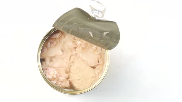 Canned Tuna on Wooden Table 