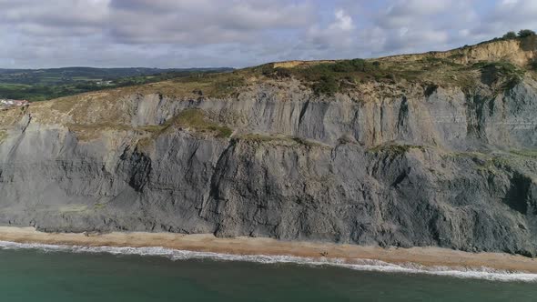 Dorset cliffs. Jurassic coast aerial tracking from east to west along the cliffs on the east side of