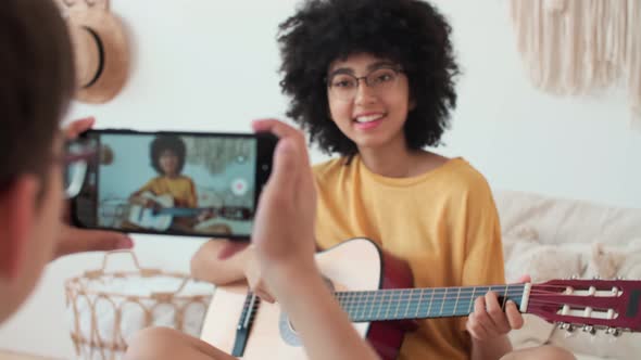 Family Bloggers Stream While Playing Guitar