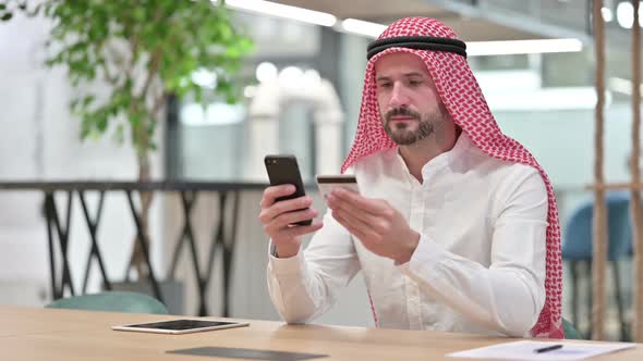 Arab Businessman with Successful Online Payment on Smartphone