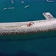 Aerial View of the Construction of the Stone Defense of the Marina - VideoHive Item for Sale