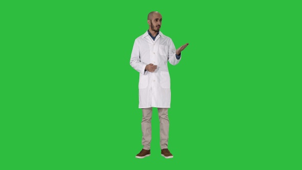 Arab Doctor Man in Medical Coat Talking and Presenting