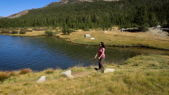 Asian woman hiking near Yosemite National Park in California