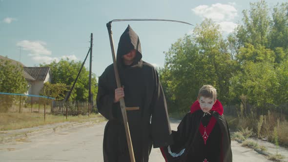 Spooky Family Going Trick or Treating on Halloween