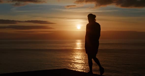 Male Silhouette with Beautiful Sunset in the Background