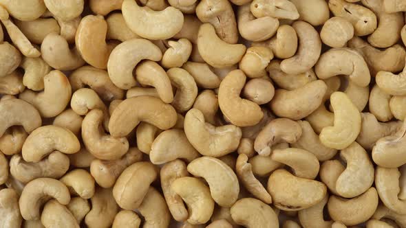 raw cashew nuts top view rotation. Healthy Food. 4K UHD video