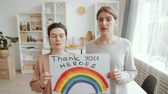 Two Women Saying Thanks to NHS at Camera during Coronavirus Lockdown