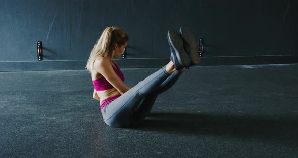 Athletic Woman Training in the Gym