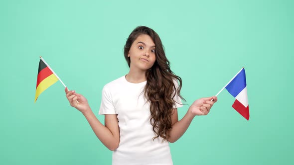 Teen Girl Making Choice Between Germany and France Choosing German Flag National Flag