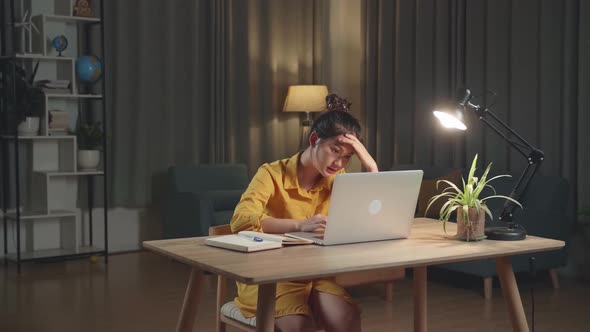 Tired Teenage Girl On The Table At Home Working Over Night