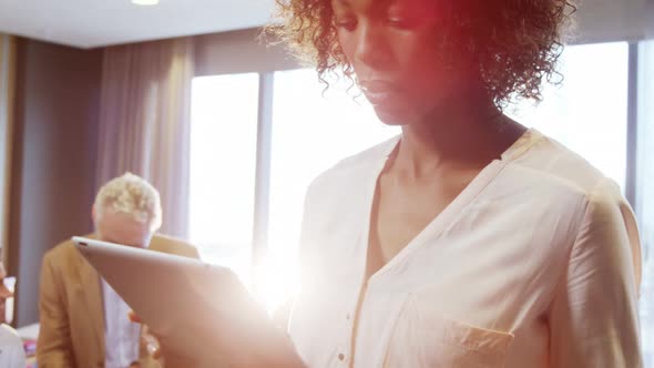 Businesswoman using digital tablet