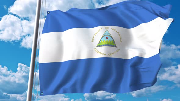Waving Flag of Nicaragua on Sky Background