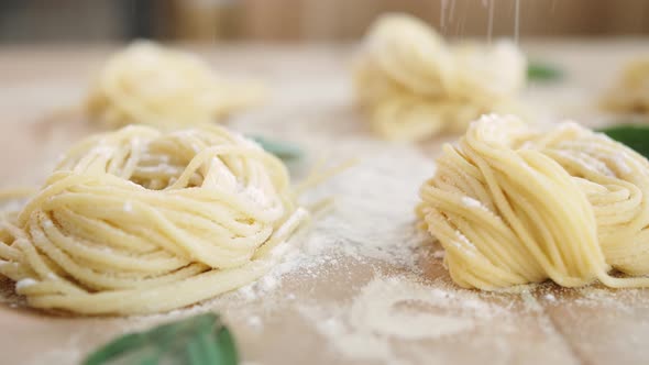 Home Made Pasta on the Table with Flour