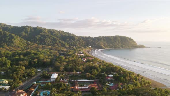 Sunset over the ocean and beautiful, tropical seaside town of Jaco on the Pacific Coast of Costa Ric