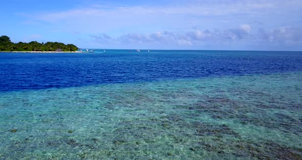 Natural overhead copy space shot of a summer white paradise sand beach and blue ocean background 