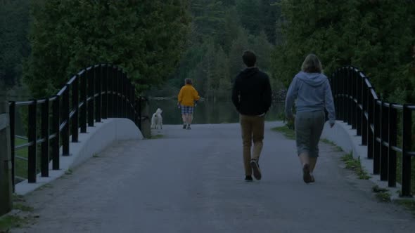 People walking on a bridge