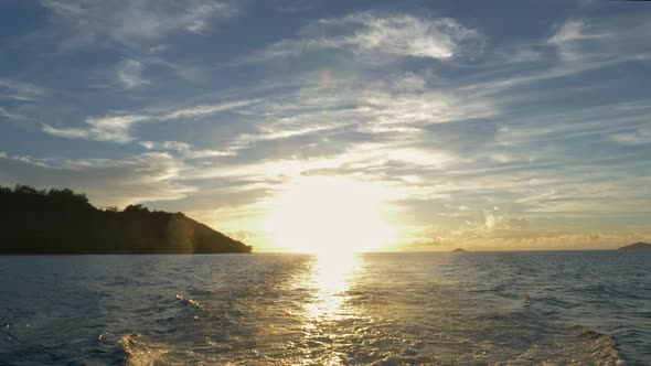 Ocean Waves Sunset with Clouds