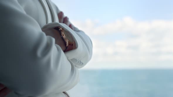 Crossed Hands Woman Looking Ocean View Closeup