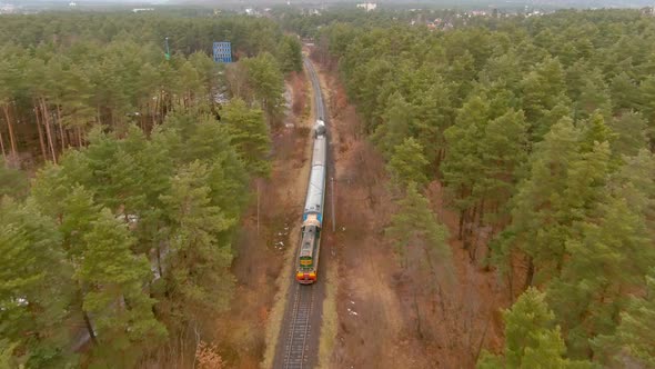 Aerial of an Antique Restored Steam Locomotive Blowing Smoke Steam Traveling