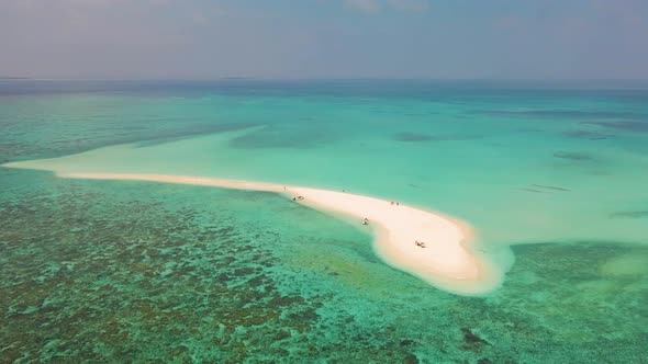 Incredible view of the island in the ocean with the beach Gorgeous color of the water.