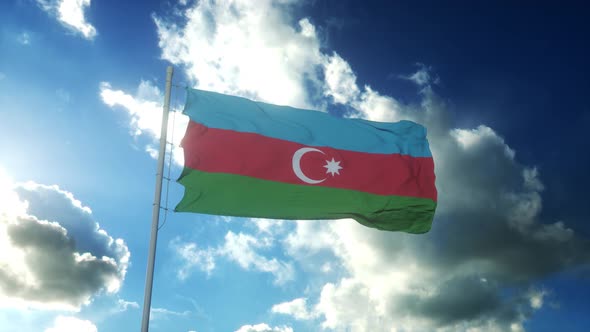 Flag of Azerbaijan Waving at Wind Against Beautiful Blue Sky